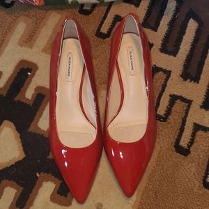 Pair of Alex Marie, size 8.5M, candy apple red heals.
